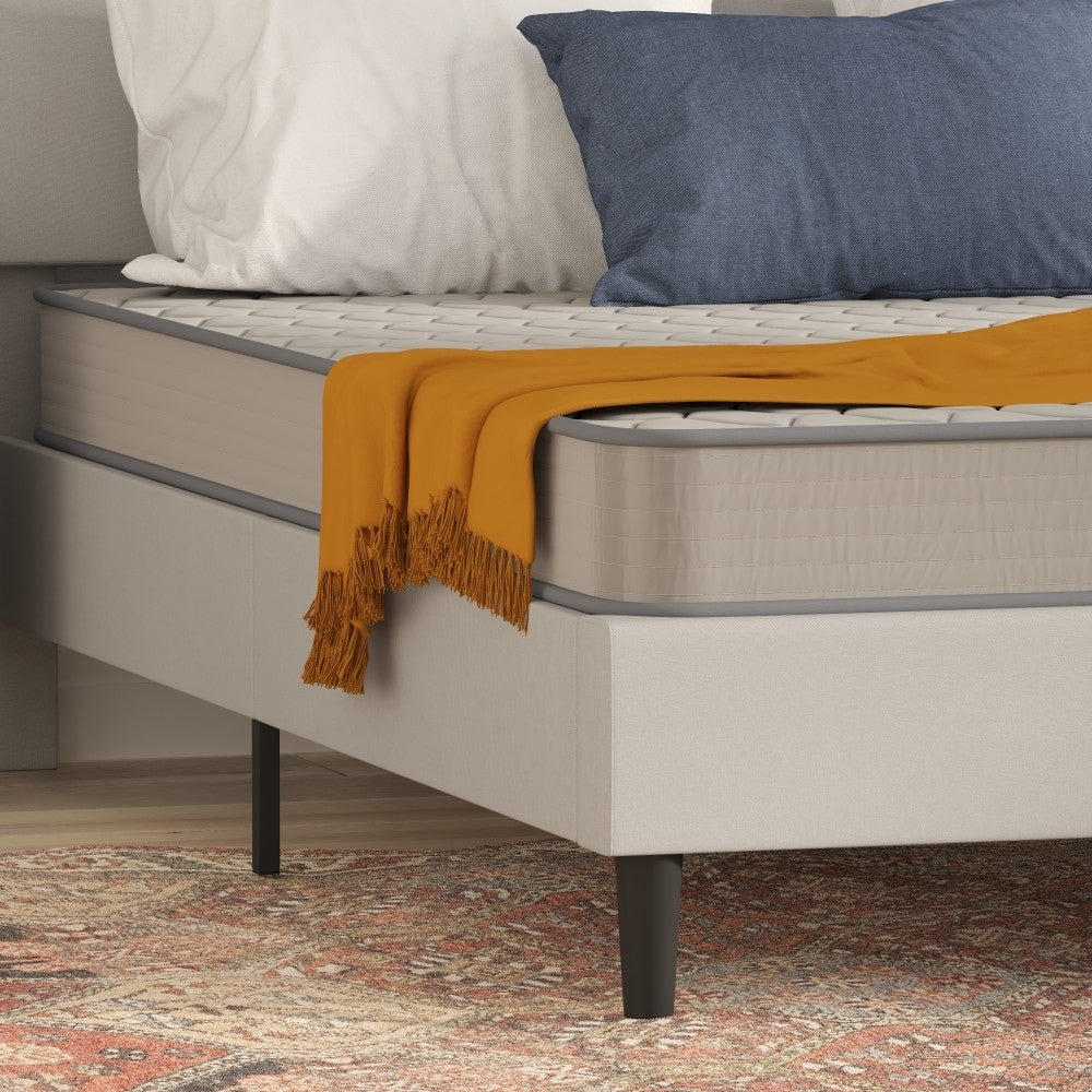 Matelas hybride à ressorts et plateau moyen