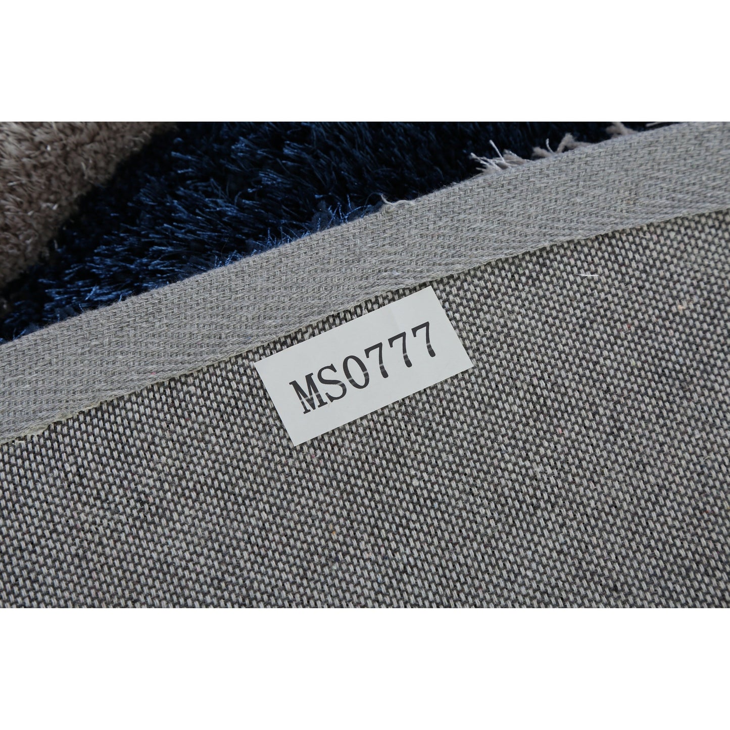 Tapis à poils longs Mateos au design abstrait