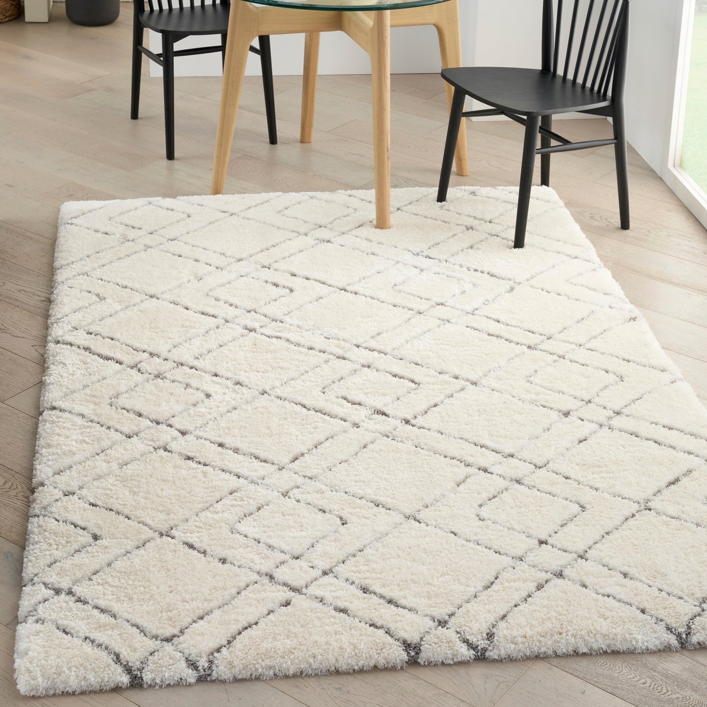 Tapis Nourison luxueux à poils longs et ultra moelleux, motif géométrique abstrait