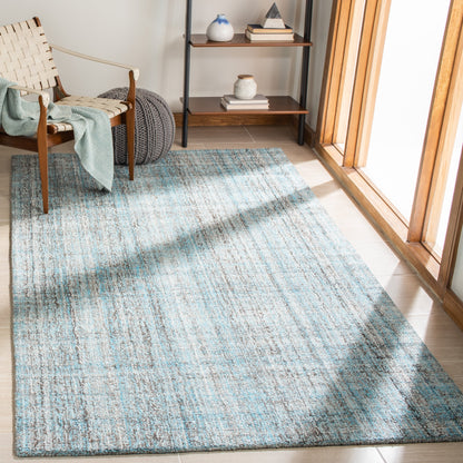 SAFAVIEH Handmade Abstract Coraly Modern Viscose Rug