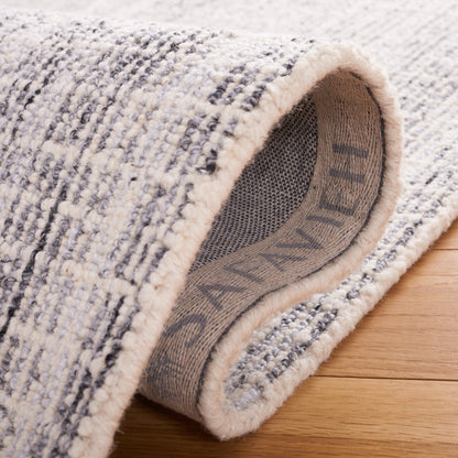 SAFAVIEH Handmade Abstract Maggy Modern Wool Rug