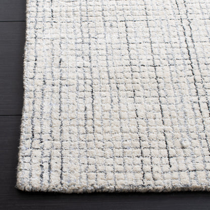 SAFAVIEH Handmade Abstract Marikka Modern Viscose Rug